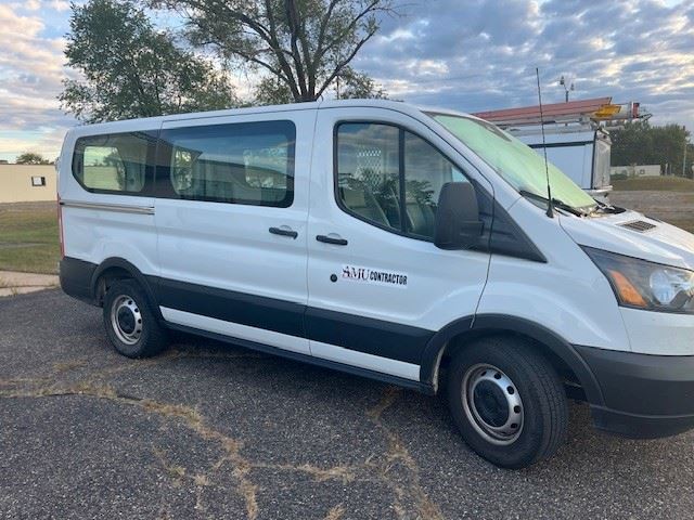 Wesco our third party vender. Picture with van and AMU Contractor logo.